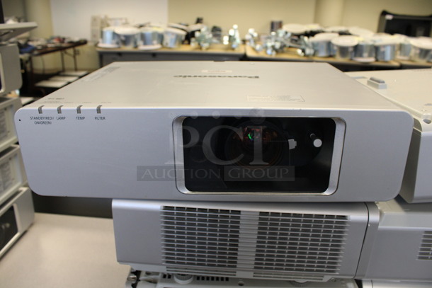 3 Panasonic Model PT-FW300NTU LCD Projectors. 100-240 Volts, 1 Phase. 17x13x5. 3 Times Your Bid! (2nd Floor: Room 220)