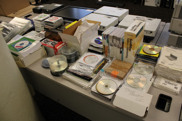 ALL ONE MONEY! Lot of Various CDs on Tabletop Including Autodesk Education Master Suite Case! (2nd Floor: Room 220) - Image 1 of 7