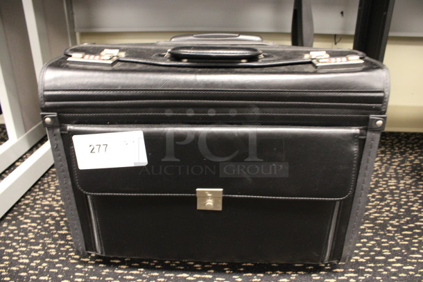 Black Lockable Briefcase Bag w/ Handle on Wheels. Does Not Have Combination. 19x9.5x14. (2nd Floor: Room 220)