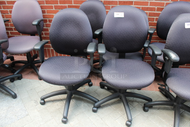 4 Purple Patterned Office Chairs w/ Arm Rests on Casters. 23x21x39. 4 Times Your Bid! (Atrium)