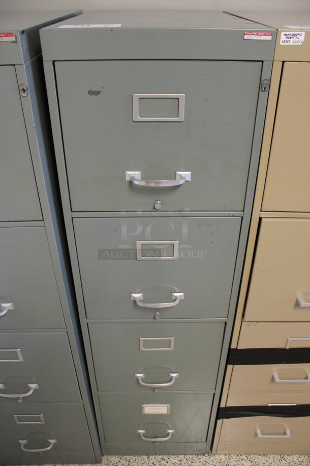 Green Metal 4 Drawer Filing Cabinet. Locked. 15x27x52.5. (Hallways Straight Off Of Atrium)