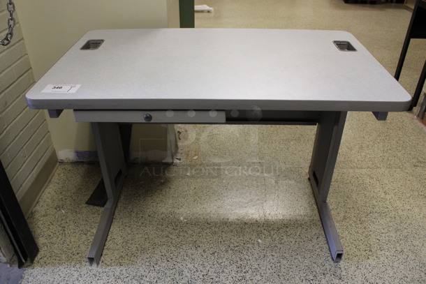 Gray Desk w/ Drawer. 42x24x30. (Hallways Straight Off Of Atrium) - Image 1 of 6