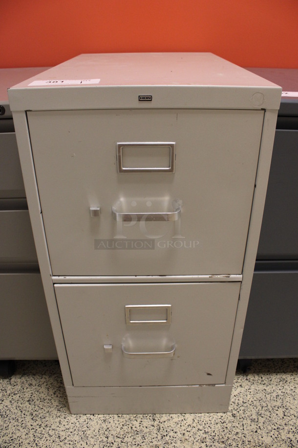 Hon Tan Metal 2 Drawer Filing Cabinet. 15x26x29. (Hallway To The Right of Atrium Lobby)