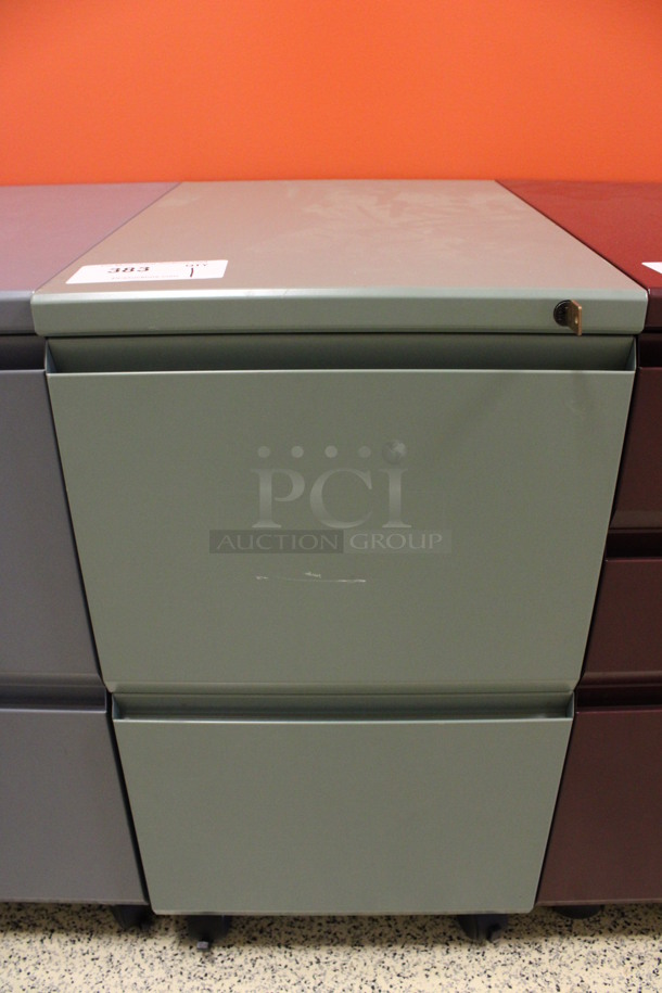 Green Metal 2 Drawer Filing Cabinet on Casters. 15x22x28. (Hallway To The Right of Atrium Lobby)