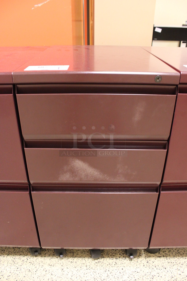 Maroon Metal 3 Drawer Filing Cabinet on Casters. 15x22x28. (Hallway To The Right of Atrium Lobby)