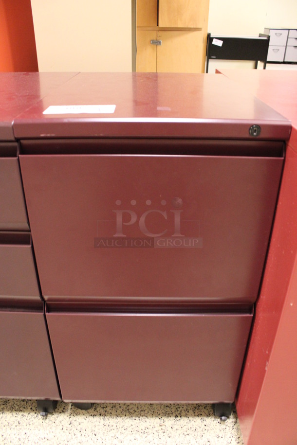 Maroon Metal 2 Drawer Filing Cabinet on Casters. 15x22x28. (Hallway To The Right of Atrium Lobby)