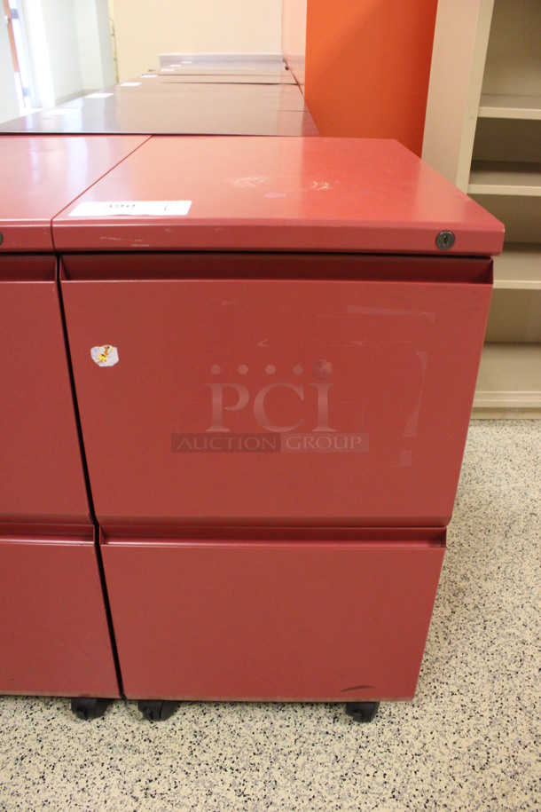Red Metal 2 Drawer Filing Cabinet on Casters. 15x22x28. (Hallway To The Right of Atrium Lobby)