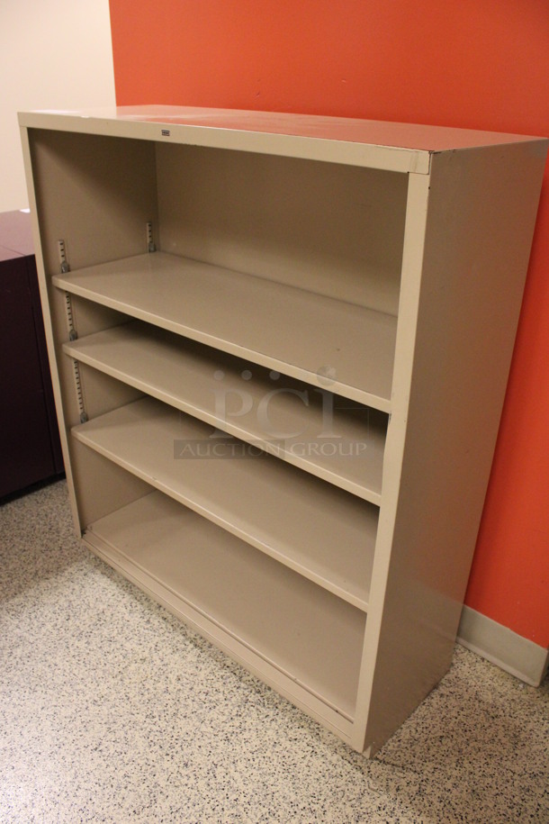 Hon Tan Metal Bookshelf. 34.5x13x41. (Hallway To The Right of Atrium Lobby)  - Image 2 of 4