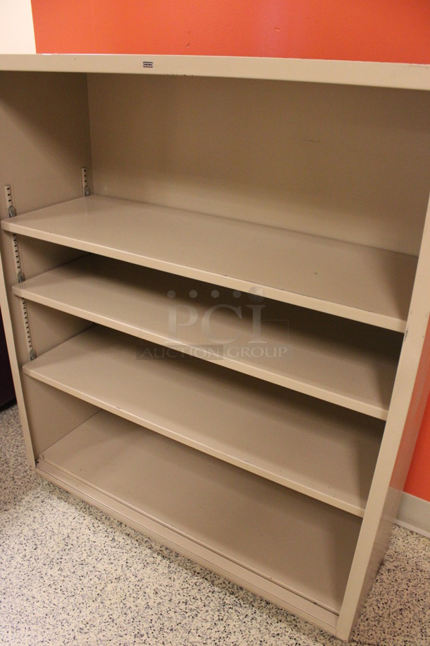 Hon Tan Metal Bookshelf. 34.5x13x41. (Hallway To The Right of Atrium Lobby)  - Image 3 of 4