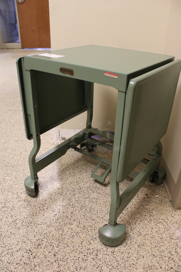 Green Metal Table on Casters. 20x18x27. (Hallway To The Right of Atrium Lobby) - Image 2 of 6