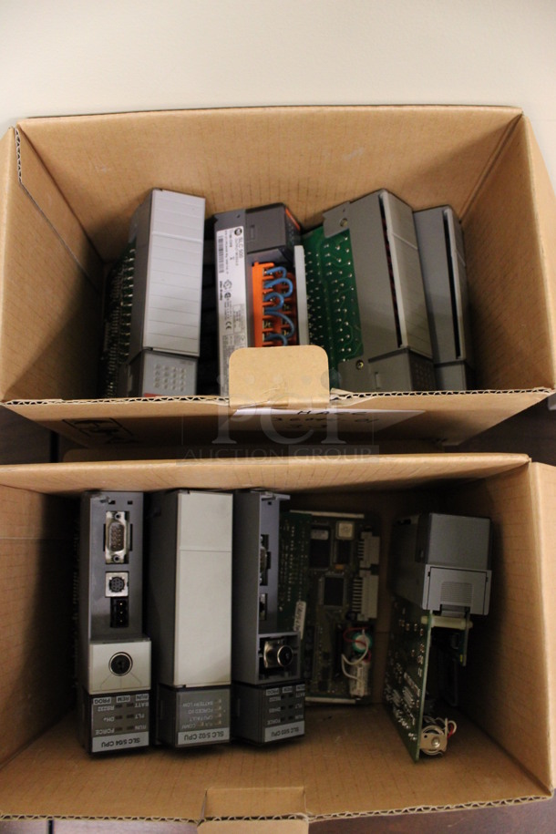 ALL ONE MONEY! Lot of 2 Boxes of Various SLC CPU Units. 1.5x5.5x6. (Room 105)