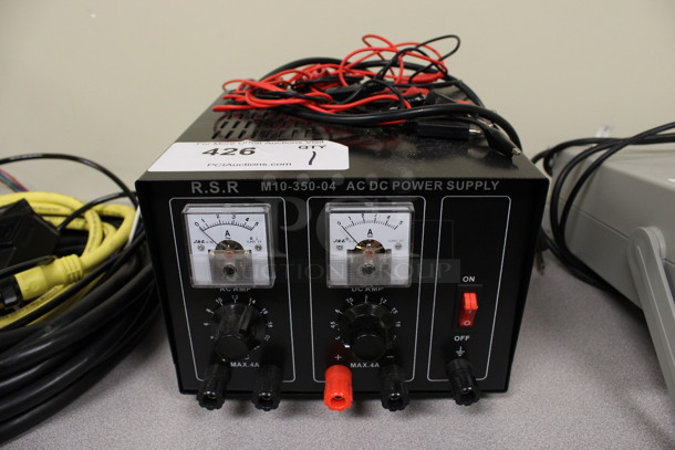 RSR Model M10-350-04 AC DC Power Supply. 8x9x6. (Room 105)