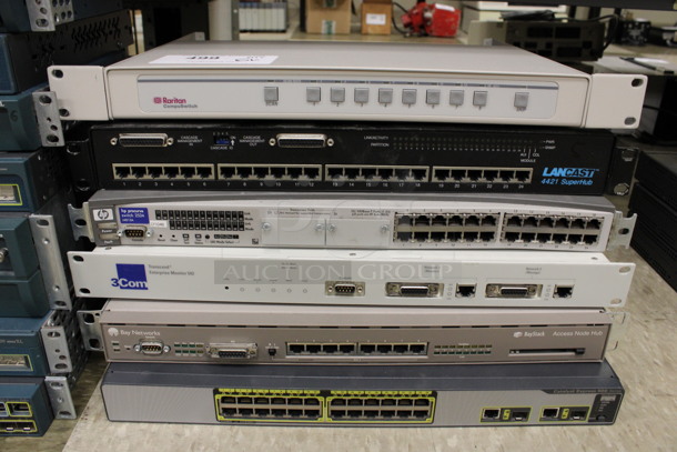 6 Various Rack Units Including Raritan CompuSwitch, HP Procurve, 3Com, Bay Networks. Includes 19x13x2. 6 Times Your Bid! (Room 105) 