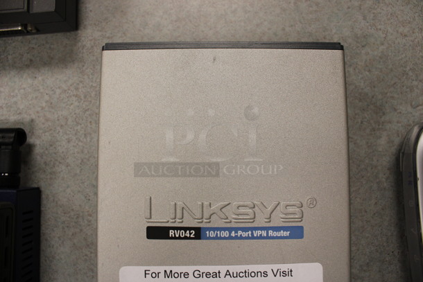 Cisco Systems RV042 Router. 5x8x1.5. (Room 105) - Image 3 of 4
