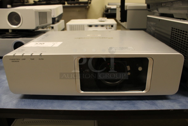 Panasonic Model PT-F300NTU LCD Projector. 100-240 Volts, 1 Phase. 17x13x5. (Room 105)