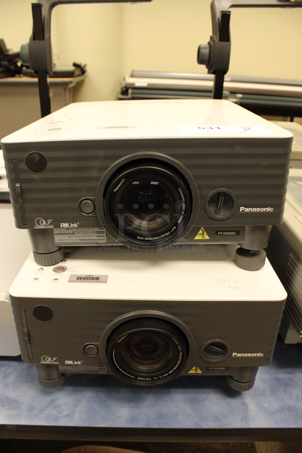 2 Panasonic Model PT-D3500U Projectors. 13x17x7. 2 Times Your Bid! (Room 105)