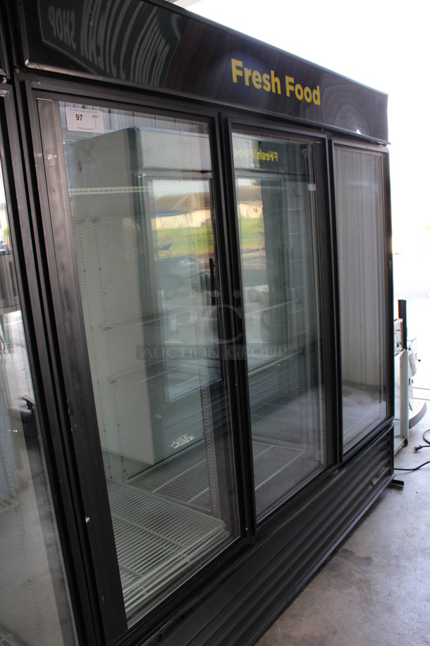True Model GDM-72 ENERGY STAR Metal Commercial 3 Door Reach In Cooler Merchandiser w/ Poly Coated Racks. 115 Volts, 1 Phase. 78x30x80. Tested and Powers On But Does Not Get Cold