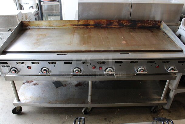 Vulcan Hart Model 972RX-102 Stainless Steel Commercial Countertop Propane Gas Powered Flat Top Griddle w/ Thermostatic Controls on Stainless Steel Equipment Stand w/ Commercial Casters. 162,000 BTU. 72x33x39 - Image 1 of 7