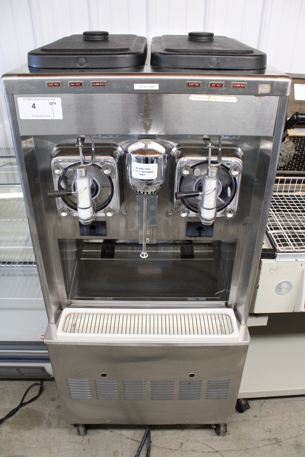 2014 Taylor Model 342D-27 Stainless Steel Commercial Floor Style Air Cooled 2 Flavor Frozen Beverage Machine w/ Drink Mixer Attachment on Commercial Casters. 208-230 Volts, 1 Phase. 26x33x60