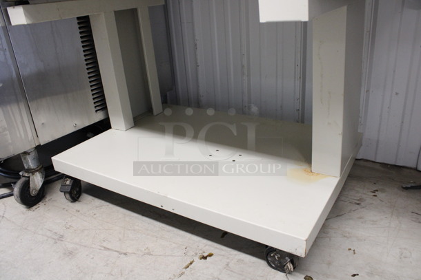 Minipack Synthesis 760 Metal Commercial Floor Style Floor Style Packaging Machine on Commercial Casters. 220-240 Volts. 51x31x46 - Image 8 of 9