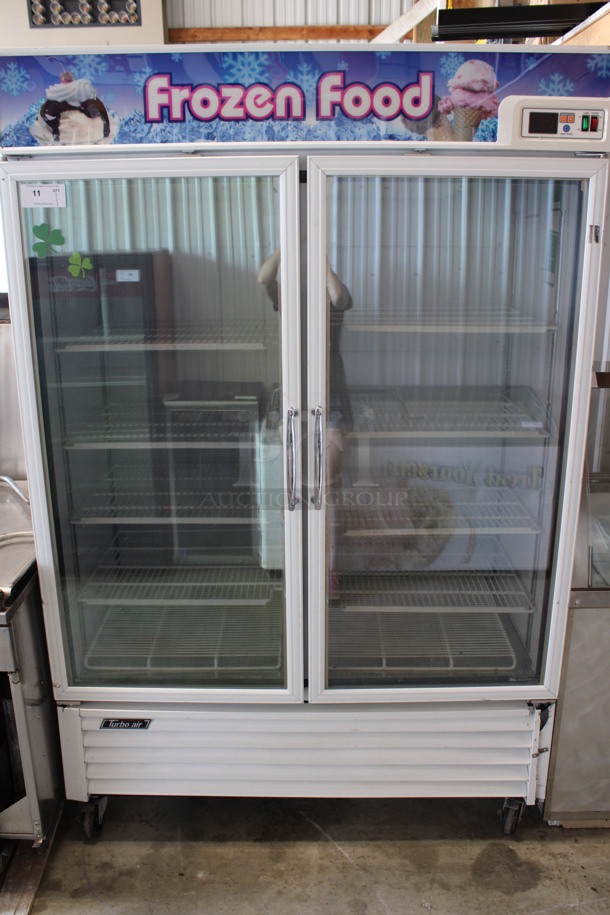 Turbo Air Model TGF-49F Metal Commercial 2 Door Reach In Freezer Merchandiser w/ Poly Coated Racks on Commercial Casters. 110-120/220-240 Volts, 1 Phase. 54.5x31x83