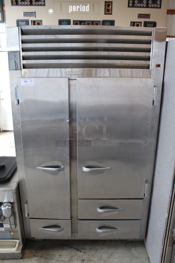 Traulsen Model URS 48 DT Stainless Steel Commercial Cooler w/ 2 Doors, 3 Drawers and Metal Racks on Commercial Casters. 115 Volts, 1 Phase. 48x28x81. Tested and Powers On But Does Not Get Cold