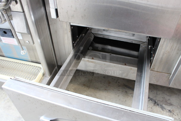 Traulsen Model URS 48 DT Stainless Steel Commercial Cooler w/ 2 Doors, 3 Drawers and Metal Racks on Commercial Casters. 115 Volts, 1 Phase. 48x28x81. Tested and Powers On But Does Not Get Cold - Image 8 of 8