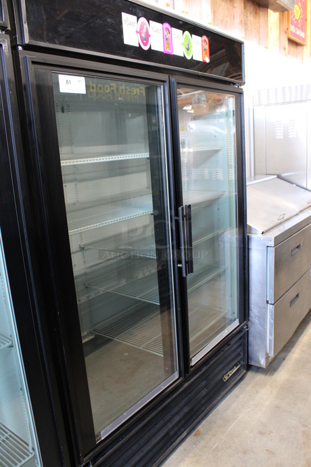 2011 True Model GDM-49 ENERGY STAR Metal Commercial 2 Door Reach In Cooler Merchandiser w/ Poly Coated Racks. 115 Volts, 1 Phase. 54x31x79. Tested and Powers On But Does Not Get Cold