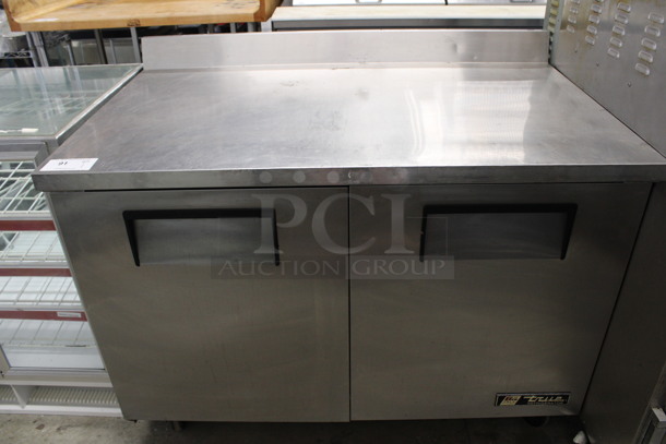 True Model TWT-48 Stainless Steel Commercial 2 Door Work Top Cooler on Commercial Casters. 115 Volts, 1 Phase. 48x30.5x40. Tested and Powers On But Does Not Get Cold - Image 1 of 6