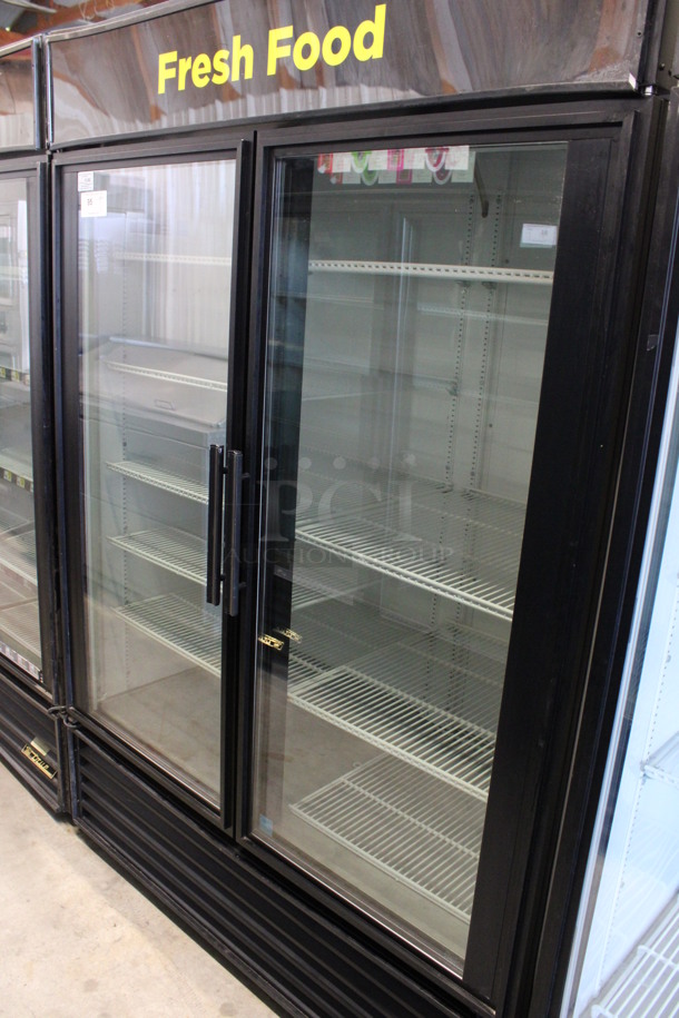 2013 True Model GDM-49 ENERGY STAR Metal Commercial 2 Door Reach In Cooler Merchandiser w/ Poly Coated Racks. 115 Volts, 1 Phase. 54x31x79. Tested and Powers On But Does Not Get Cold