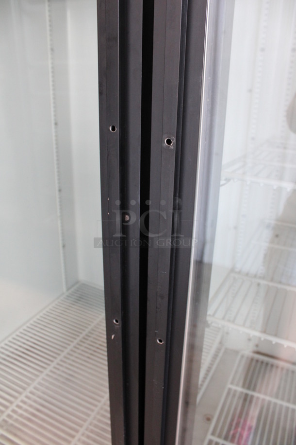 True Model GDM-72 ENERGY STAR Metal Commercial 3 Door Reach In Cooler Merchandiser w/ Poly Coated Racks. 115 Volts, 1 Phase. 78x30x80. Tested and Powers On But Does Not Get Cold - Image 3 of 8