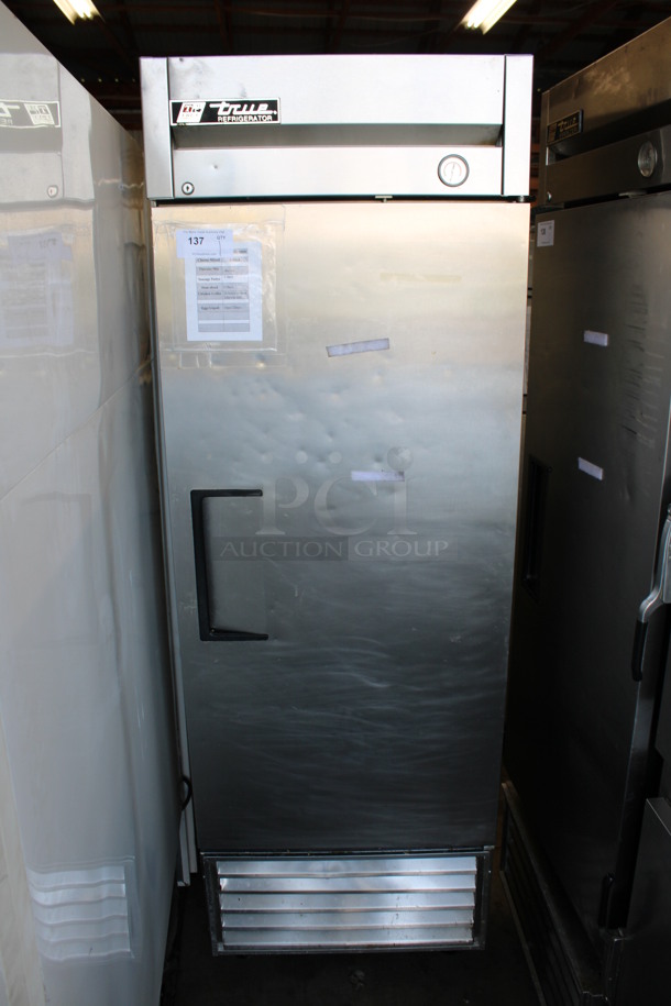 True Model T-23 Stainless Steel Commercial Single Door Reach In Cooler w/ Poly Coated Racks on Commercial Casters. 115 Volts, 1 Phase. 27x30x83. Tested and Working! - Image 1 of 5