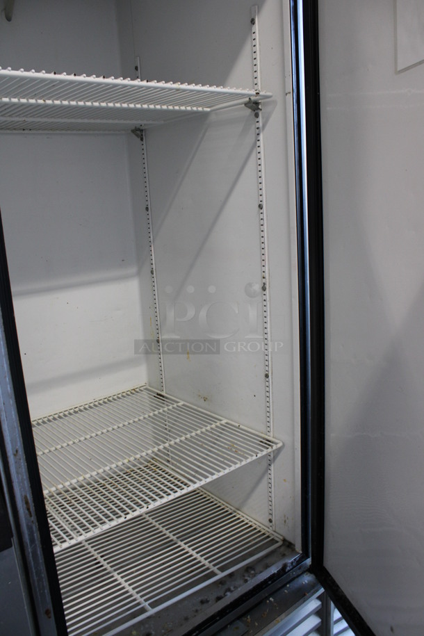 True Model T-23 Stainless Steel Commercial Single Door Reach In Cooler w/ Poly Coated Racks on Commercial Casters. 115 Volts, 1 Phase. 27x30x83. Tested and Working! - Image 3 of 5