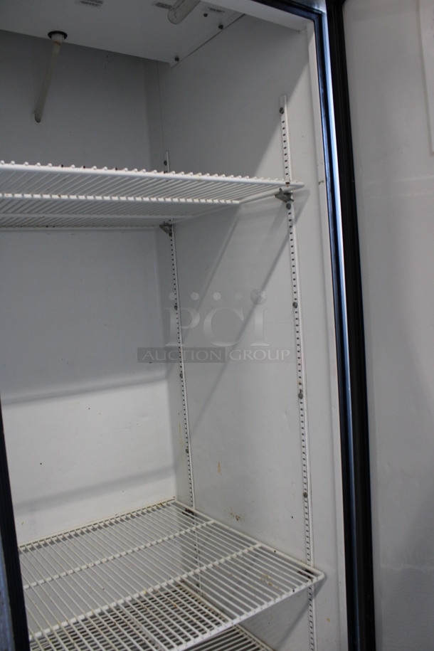 True Model T-23 Stainless Steel Commercial Single Door Reach In Cooler w/ Poly Coated Racks on Commercial Casters. 115 Volts, 1 Phase. 27x30x83. Tested and Working! - Image 4 of 5