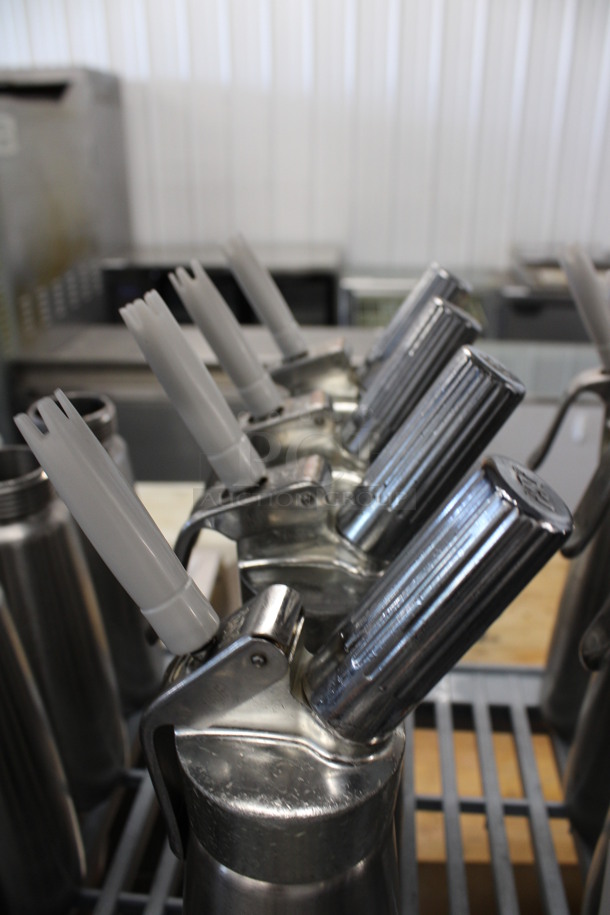 4 Stainless Steel Whipped Cream Dispensers. 5x3x12. 4 Times Your Bid! - Image 3 of 4