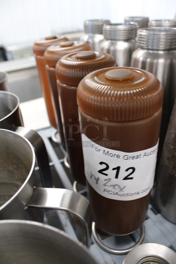 4 Brown Poly Condiment Bottles on Metal Stand. Comes w/ Extra Lid and Metal Piece. 2.5x2.5x7.5. 4 Times Your Bid! - Image 3 of 6