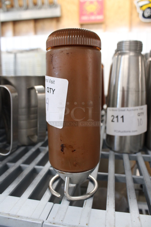 4 Brown Poly Condiment Bottles on Metal Stand. Comes w/ Extra Lid and Metal Piece. 2.5x2.5x7.5. 4 Times Your Bid! - Image 5 of 6