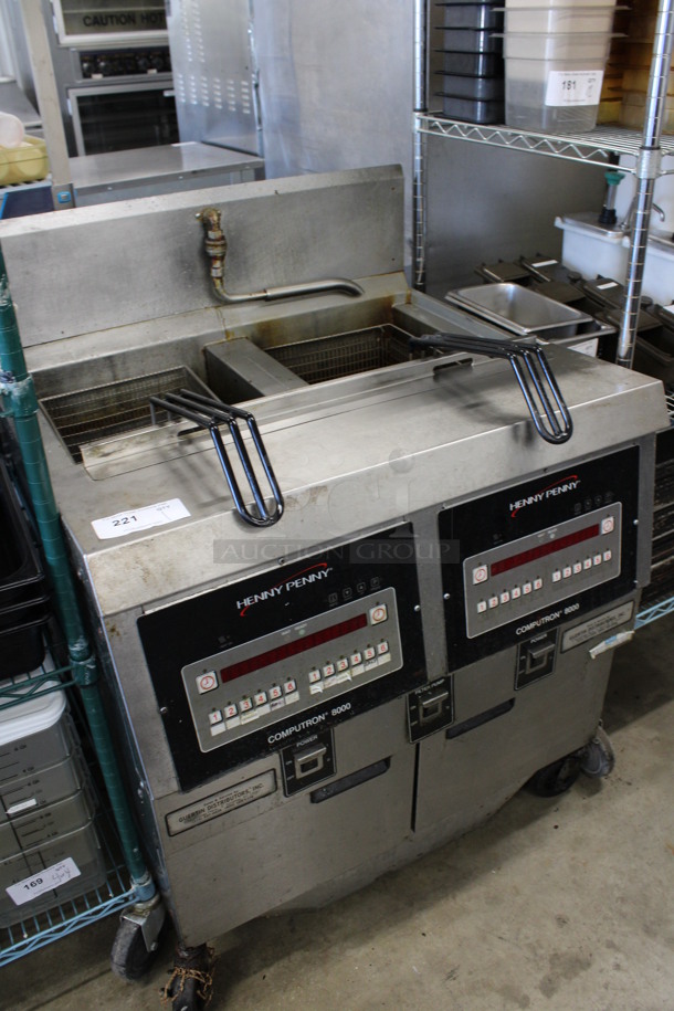 Henny Penny Model OFG-322 Stainless Steel Commercial Natural Gas Powered 2 Bay Deep Fat Fryer w/ 2 Metal Fry Baskets and Filtration System on Commercial Casters. 170,000 BTU. 33.5x33.5x45 - Image 2 of 8