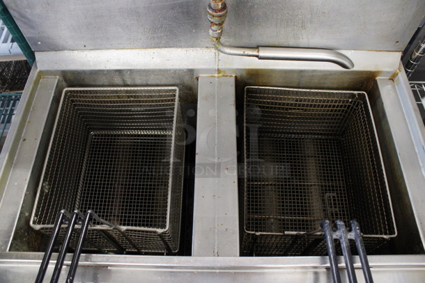 Henny Penny Model OFG-322 Stainless Steel Commercial Natural Gas Powered 2 Bay Deep Fat Fryer w/ 2 Metal Fry Baskets and Filtration System on Commercial Casters. 170,000 BTU. 33.5x33.5x45 - Image 4 of 8