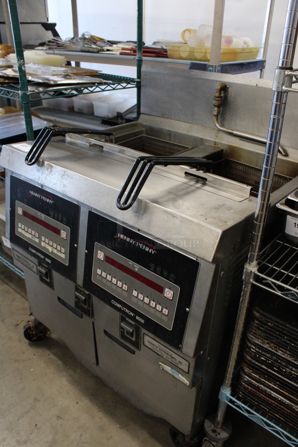 Henny Penny Model OFG-322 Stainless Steel Commercial Natural Gas Powered 2 Bay Deep Fat Fryer w/ 2 Metal Fry Baskets and Filtration System on Commercial Casters. 170,000 BTU. 33.5x33.5x45 - Image 5 of 8
