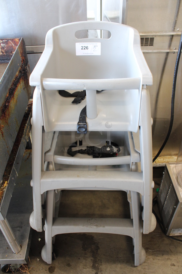 2 Gray Poly High Chairs on Casters. 22x23x30. 2 Times Your Bid!