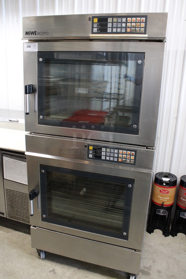 2 BEAUTIFUL! MIWE Model EC 10.1826 Stainless Steel Commercial Electric Powered Econo Convection Oven w/ View Through Doors and Metal Oven Racks on Commercial Casters. 208 Volts, 3 Phase. 35.5x36x73.5. 2 Times Your Bid!