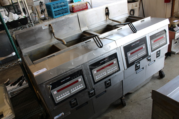 Henny Penny Model OFG-322 ENERGY STAR Stainless Steel Commercial Propane Gas Powered 4 Bay Deep Fat Fryer w/ 2 Metal Fry Baskets and Filtration System on Commercial Casters. 170,000 BTU. 67x33.5x44 - Image 2 of 10