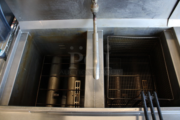 Henny Penny Model OFG-322 ENERGY STAR Stainless Steel Commercial Propane Gas Powered 4 Bay Deep Fat Fryer w/ 2 Metal Fry Baskets and Filtration System on Commercial Casters. 170,000 BTU. 67x33.5x44 - Image 3 of 10