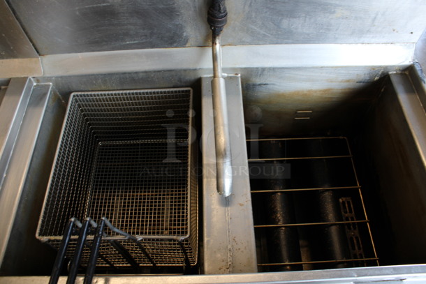 Henny Penny Model OFG-322 ENERGY STAR Stainless Steel Commercial Propane Gas Powered 4 Bay Deep Fat Fryer w/ 2 Metal Fry Baskets and Filtration System on Commercial Casters. 170,000 BTU. 67x33.5x44 - Image 4 of 10