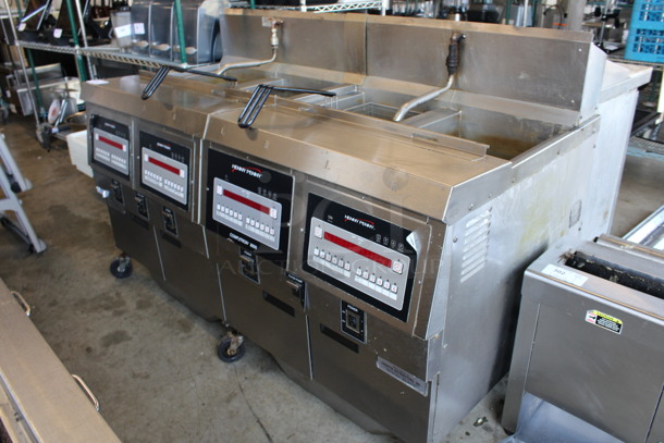 Henny Penny Model OFG-322 ENERGY STAR Stainless Steel Commercial Propane Gas Powered 4 Bay Deep Fat Fryer w/ 2 Metal Fry Baskets and Filtration System on Commercial Casters. 170,000 BTU. 67x33.5x44 - Image 5 of 10