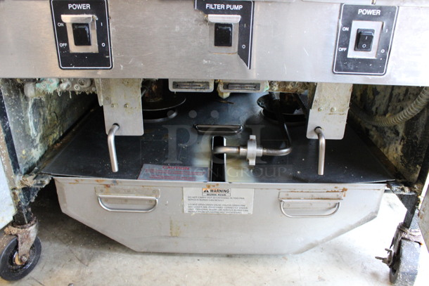 Henny Penny Model OFG-322 ENERGY STAR Stainless Steel Commercial Propane Gas Powered 4 Bay Deep Fat Fryer w/ 2 Metal Fry Baskets and Filtration System on Commercial Casters. 170,000 BTU. 67x33.5x44 - Image 8 of 10