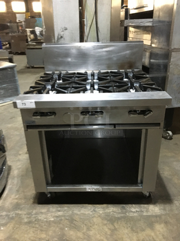 Garland Commercial Natural Gas Powered 6 Burner Stove! With Storage Space Underneath! With Backsplash! All Stainless Steel! Model U366S Serial 1709100100934! On Commercial Casters!