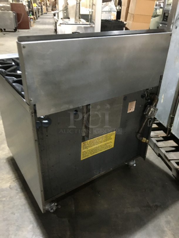 Garland Commercial Natural Gas Powered 6 Burner Stove! With Storage Space Underneath! With Backsplash! All Stainless Steel! Model U366S Serial 1709100100934! On Commercial Casters! - Image 4 of 10