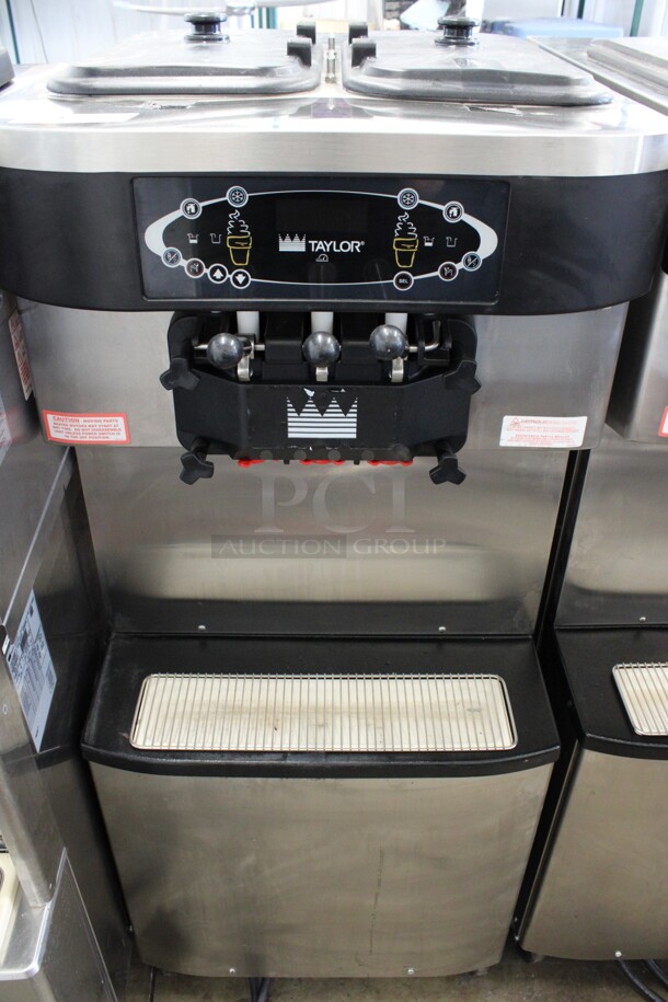 SWEET! 2012 Taylor Model C713-33 Stainless Steel Commercial Floor Style Water Cooled 2 Flavor w/ Twist Soft Serve Ice Cream Machine on Commercial Casters. 208-230 Volts, 3 Phase. 25.5x37x60 - Image 1 of 11